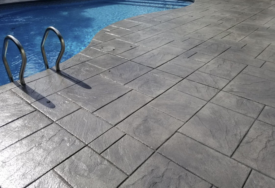 Decorative stamped concrete pool deck in Fairfield, OH