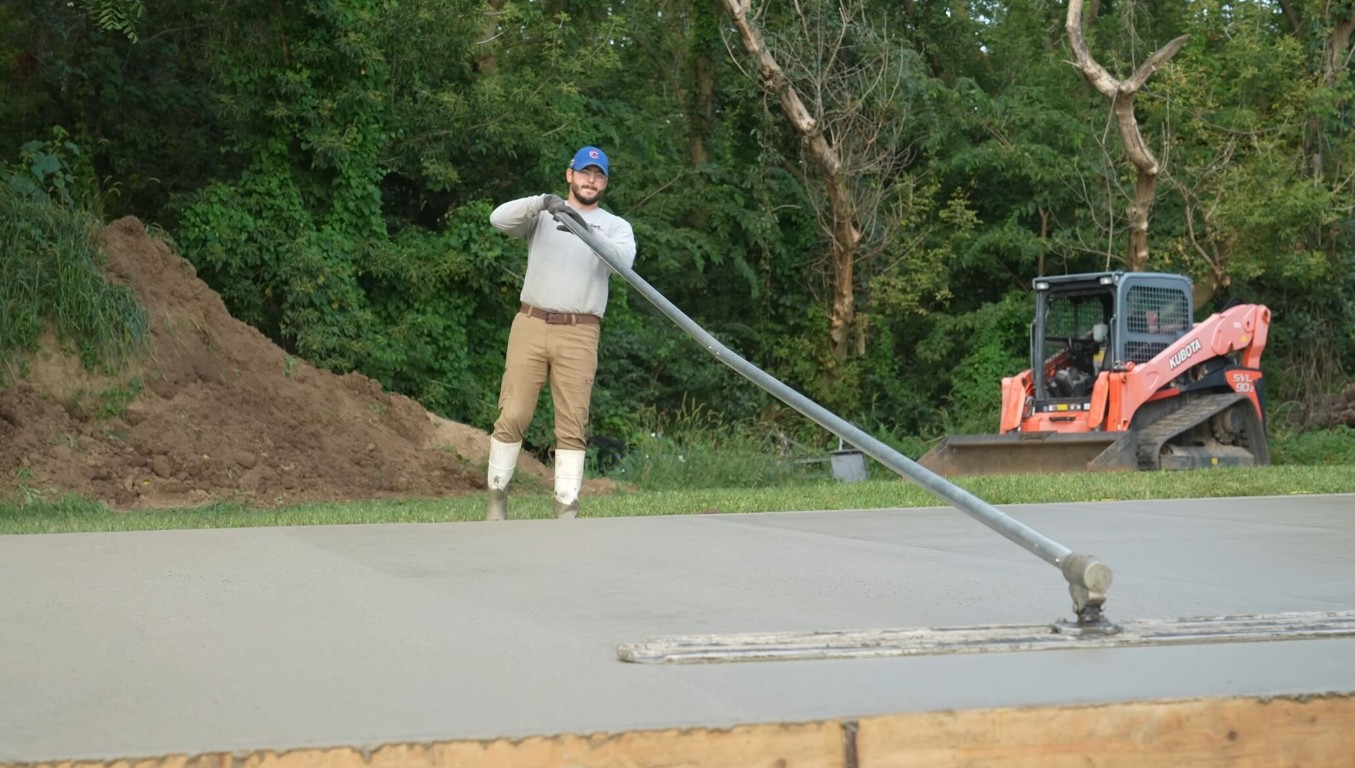 Professional concrete contractor finishing concrete surface in Fairfield, OH